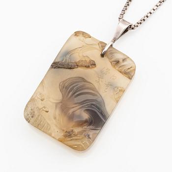 An inscribed and well carved agate 'Scholar and attendant' pendant, Qing dynasty, probably 19th century.