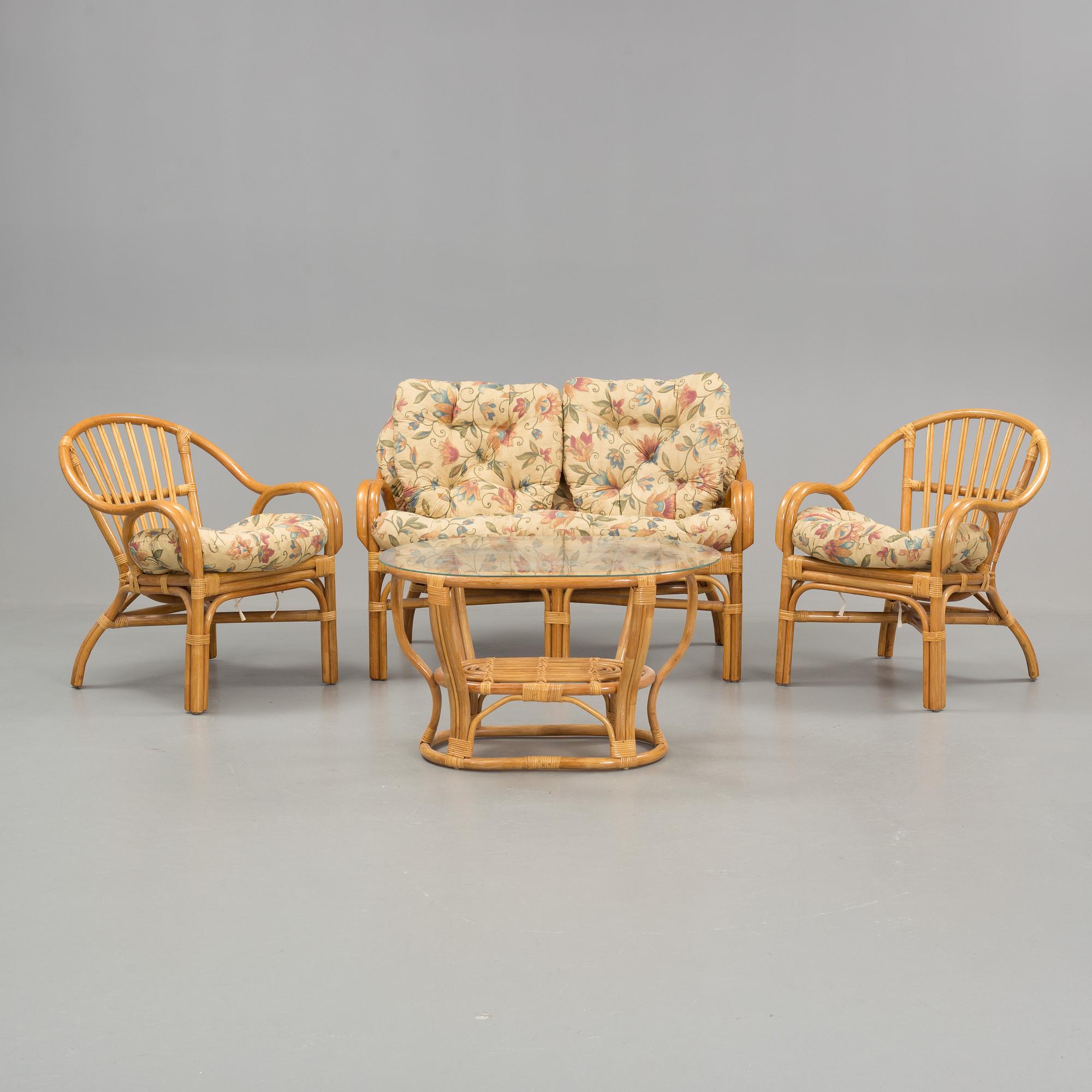 A set of sofa, easy chairs and table in four parts, late 20th century.