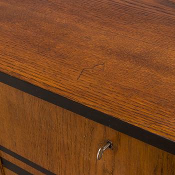A 1930s functionalist style sideboard.