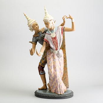 A Lladro stone ware figurine.