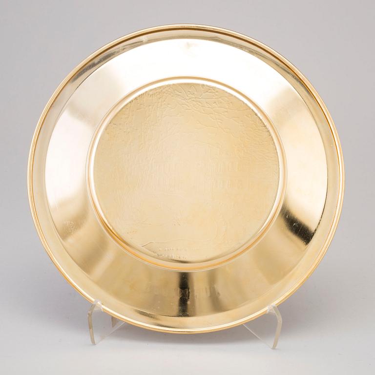 12 brass plates from Skultuna, late 20th century.