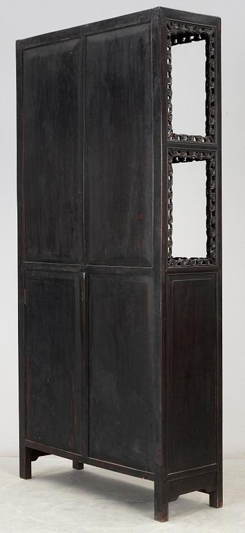 A Chinese hardwood cabinet, early 20th Century.