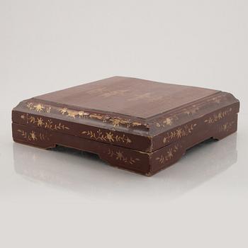 A nine piece Chinese porcelain cabaret in its original lacquer box, Qing dynasty, Qianlong (1736-95).