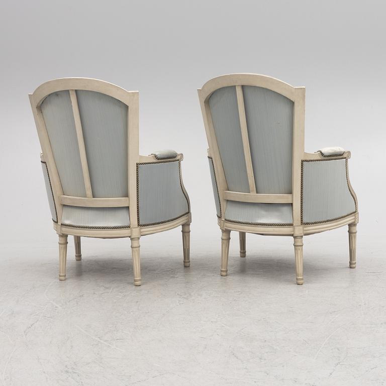 Bergeres, a pair, Louis XVI style, 20th century.