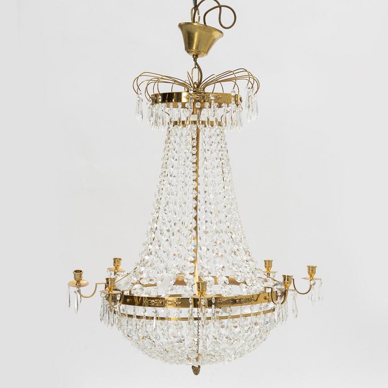 A contemporary Empire style chandelier for eight candles.