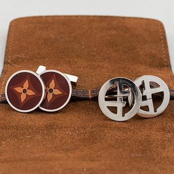 Louis Vuitton and Giorgio Armani, two pairs of cufflinks.