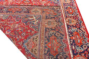 A Kashan carpet, a. 376 x 298 cm.