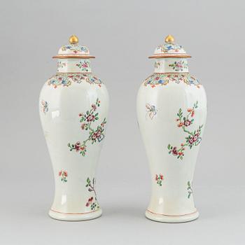 A pair of French Famille rose Samson vases with covers, end of 19th Century.