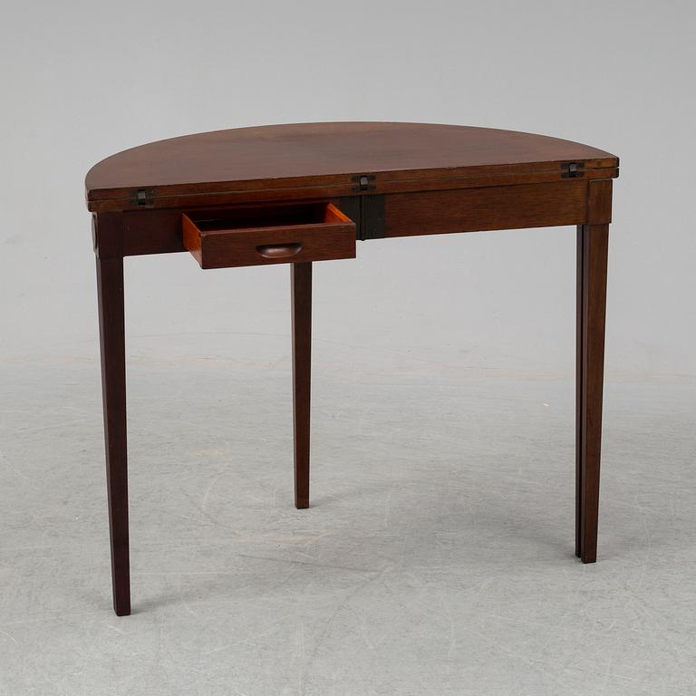 A mahogany card table from Nordiska Kompaniet. Designed 1923.
