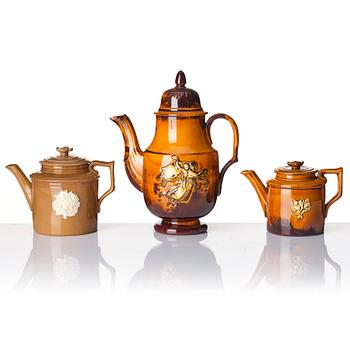 A tureen, coffee pot, two teapots, a vase and a dish, including Tillinge 19th century.