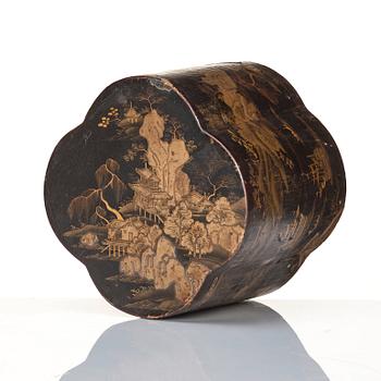 A Chinese lacquer box with a set of five pewter tea caddies, Qing dynasty, 18/19th Century.