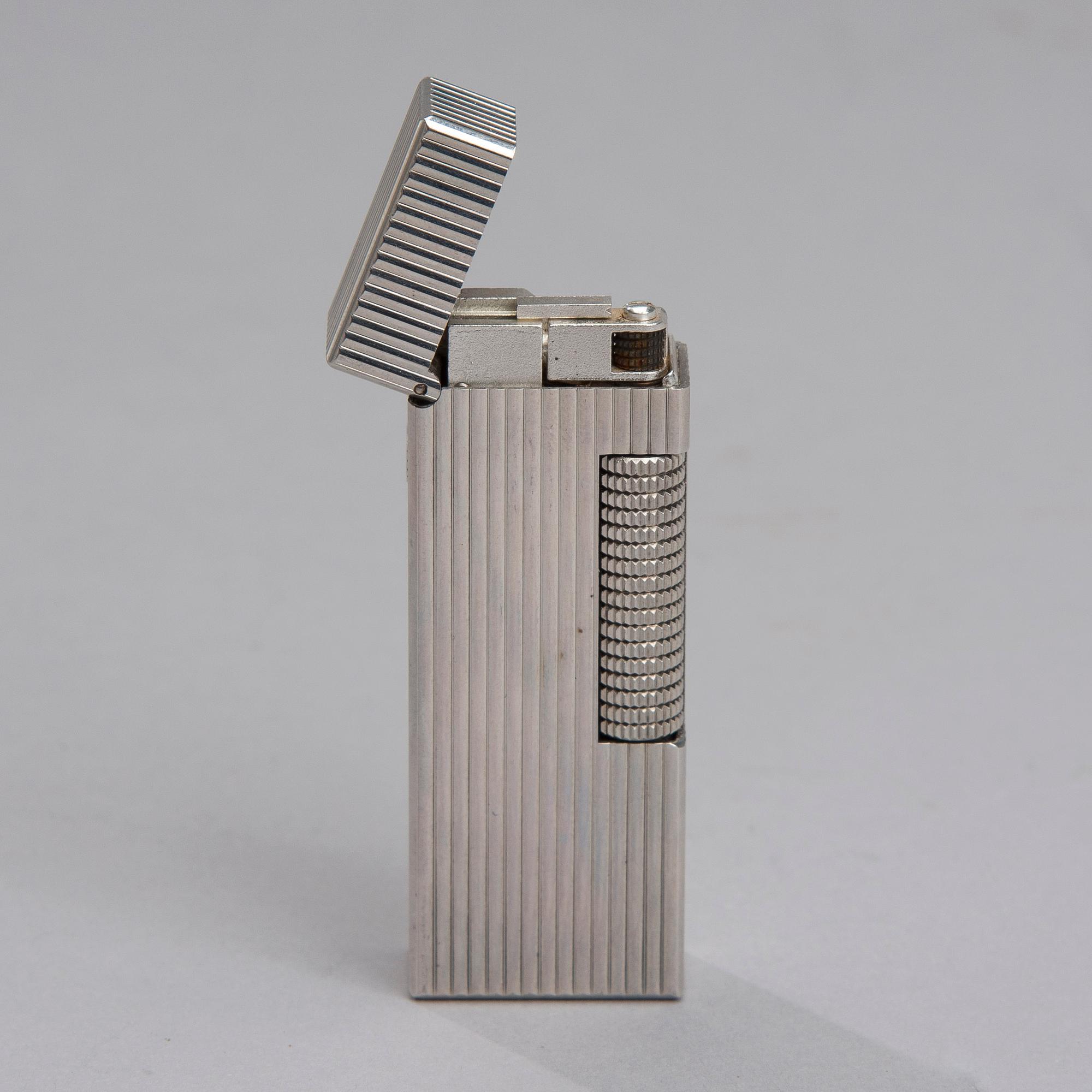 TÄNDARE, Dunhill, vitmetall.