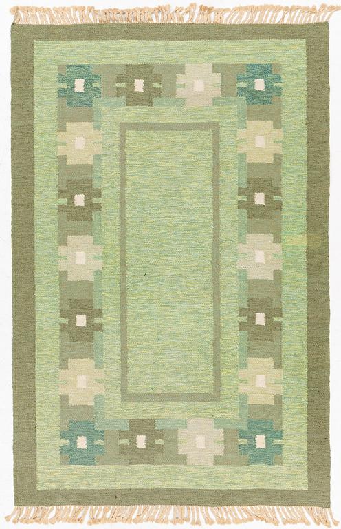 A 1960s flatweave carpet, c 203 x 134.5 cm.