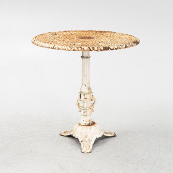 A cast iron garden table, first half of the 20th Century.