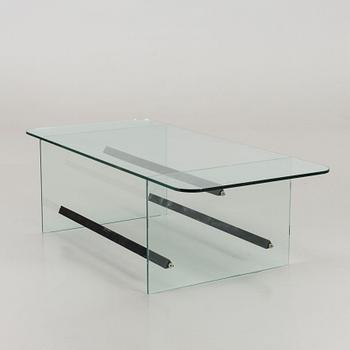 A late 20th century glass table.