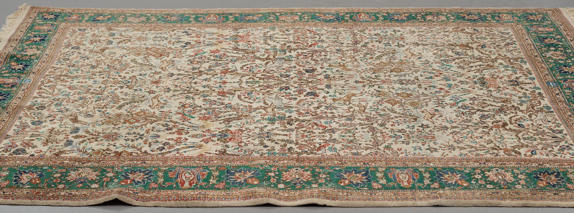 A carpet, semi-antique Tabriz figural, ca 256,5 x 205 cm.