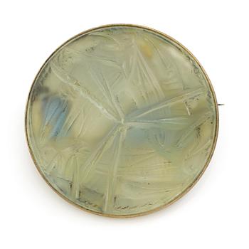 644. René Lalique, a brooch, glass, with a motif of crickets.