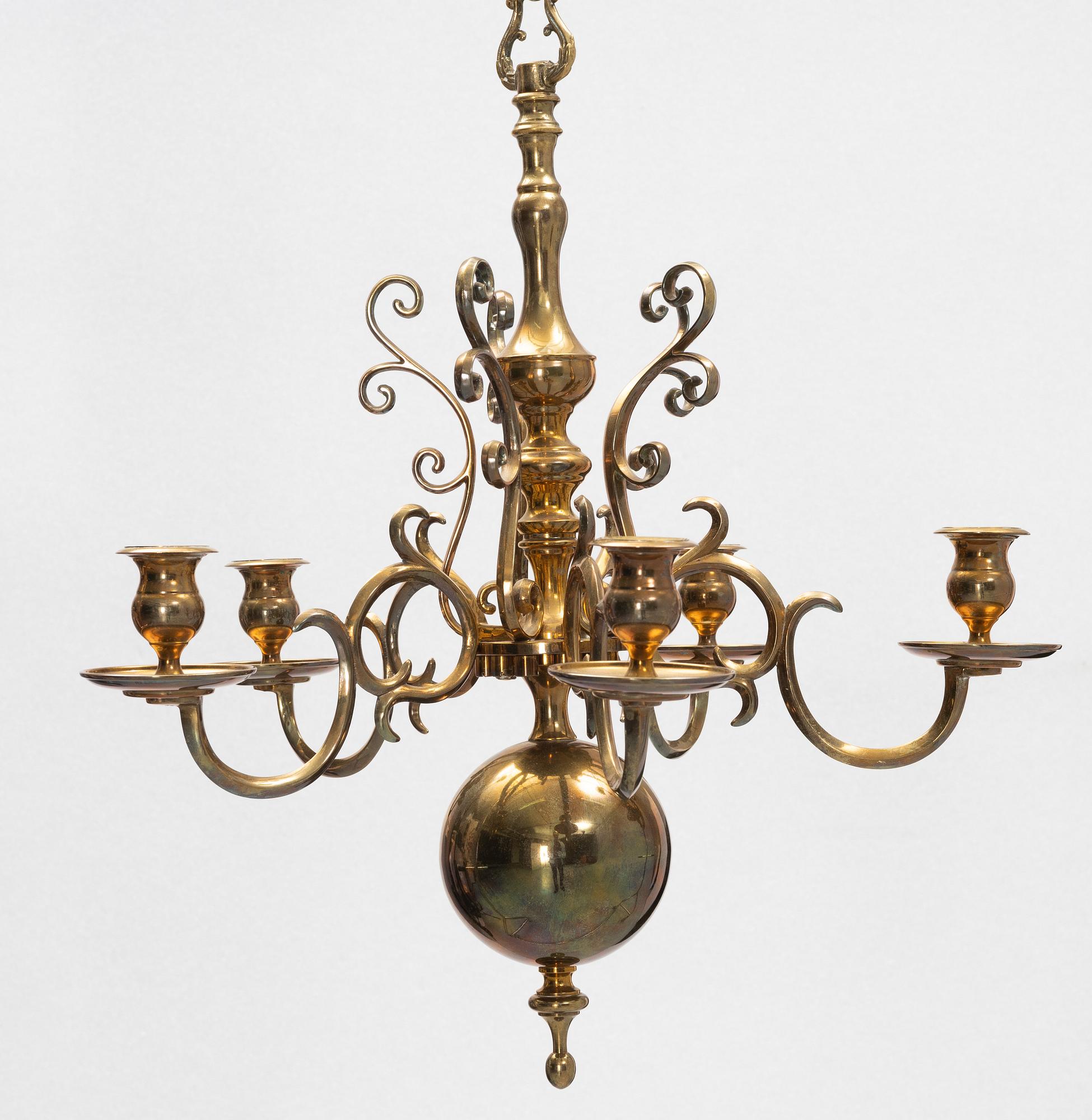 A brass chandelier, no 205, Skultuna Bruk, Sweden.
