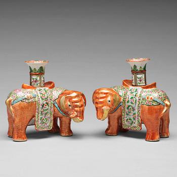 841. A pair of famille rose Canton elephant candle holders, late Qing dynasty, about 1900.