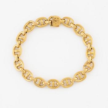 An 18K gold Cartier bracelet.