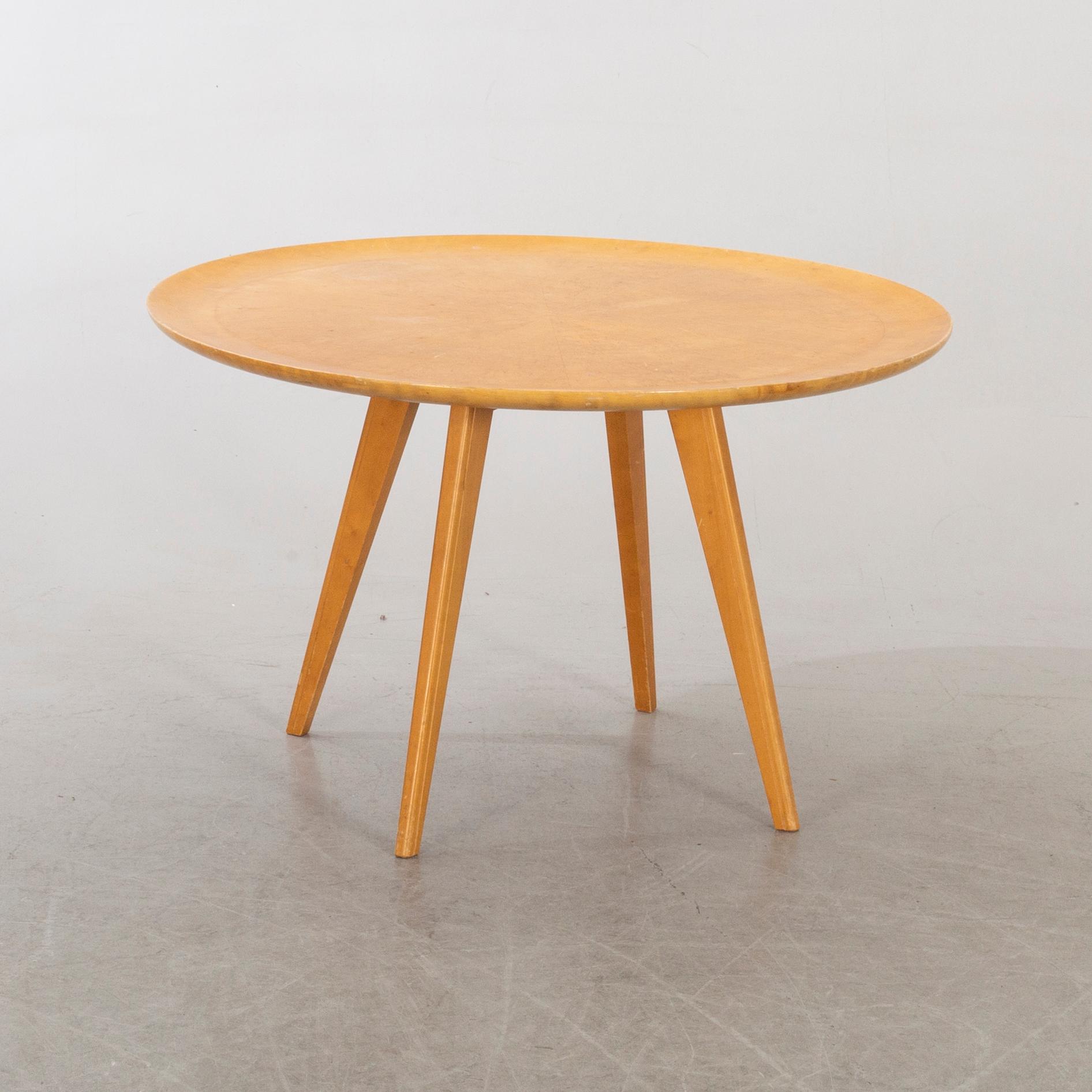 A COFFEE TABLE FROM NORDISKA KOMPANIET MID 20TH CENTURY.