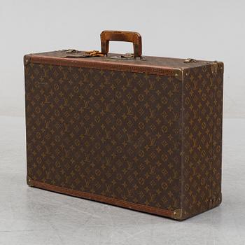 Louis Vuitton, a monogram canvas 'Bracken' suitcase, mid 20th Century.