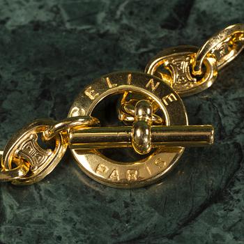 A necklace by  CÉLINE.