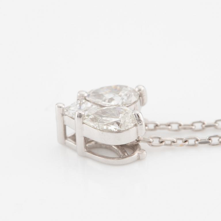 Necklace, 18K white gold heart-shaped with princess cut and pear-shaped diamonds.