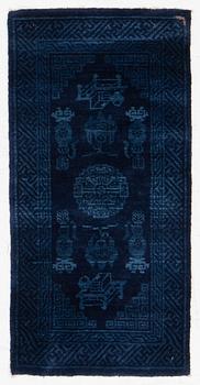 An antique Baotou, rug north China, c. 140 x 70 cm.