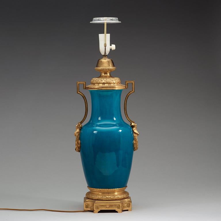 A turquoise glazed bronze mounted porcelain vase, Qing dynasty, 19th century.