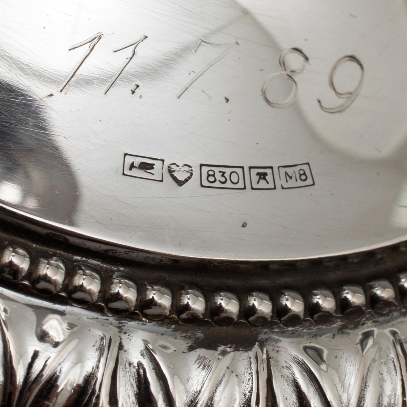 Three Finnish silver candlesticks, 1989-97.