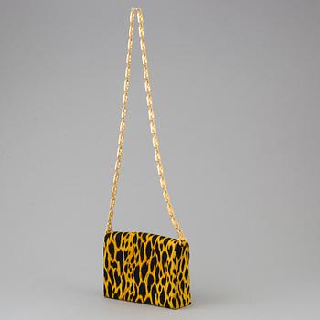 Leopard printed handbag by Gianni Versace.