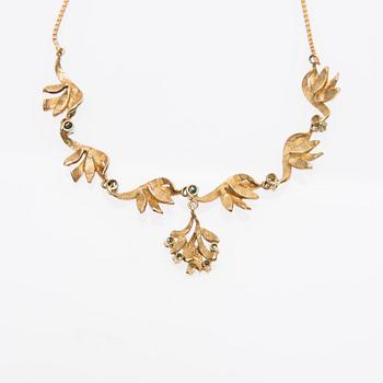 COLLIER och ÖRHÄNGEN, 14K guld, cabochonslipade turkoser. Hugo Grün, Helsingfors 1966.