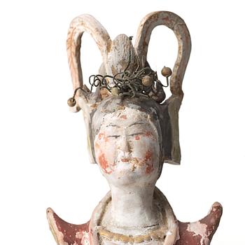 A elegant pottery figure of a court lady, Tang dynasty (618-907).