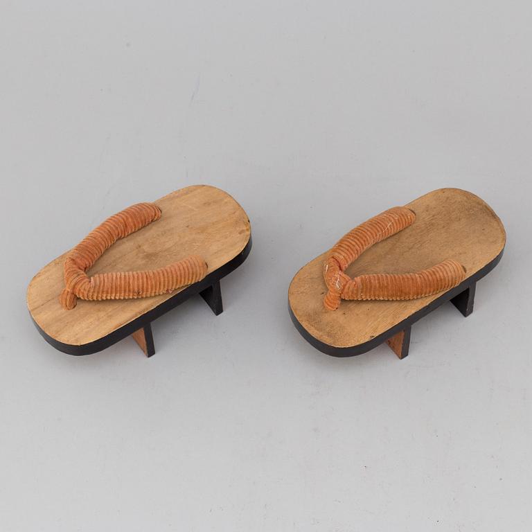 A pair of Japanese 'Geta' shows and two Chinese pouches, early 20th century.