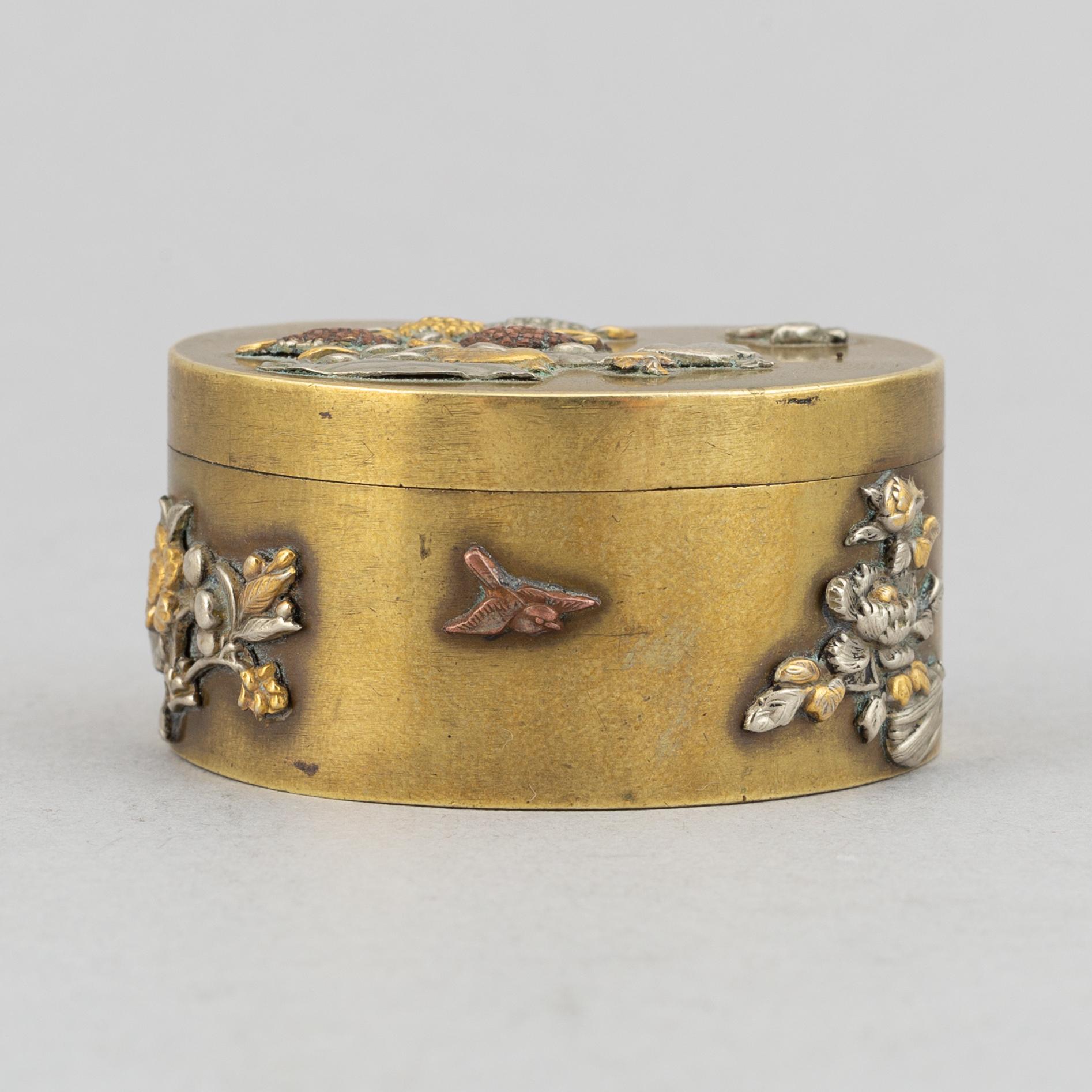 A lidded heart shaped brass box with cover, Meiji period (1868-1912), around the year 1900.