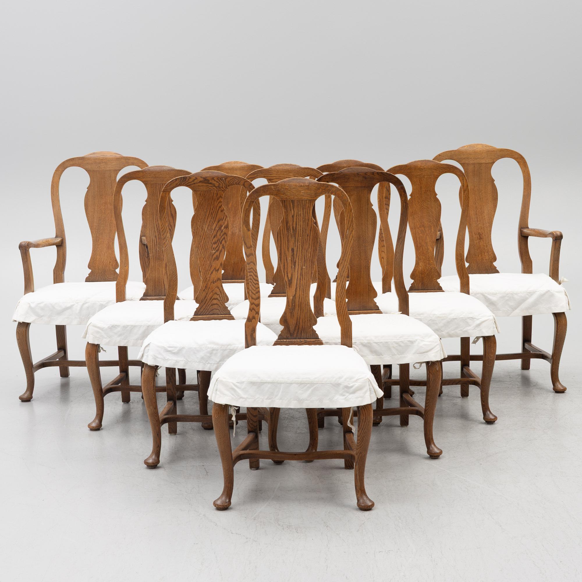 Dining table, 8 chairs, 2 armchairs, sideboard, Rococo style, early 20th century.