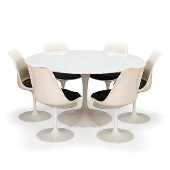 Eero Saarinen, a 1970s 'Tulip' marble-top table with six chairs.