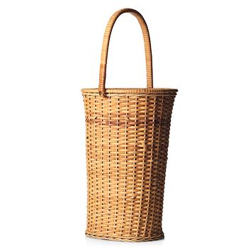 287. Firma Svenskt Tenn, a fretted rattan umbrella stand, mid 1900's, provenance Estrid Ericson.