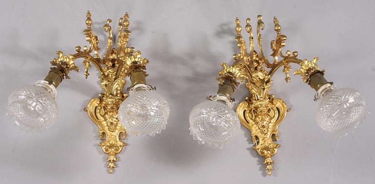 VÄGGLAMPETTER, ett par, Louis XV-stil, 1900-tal.