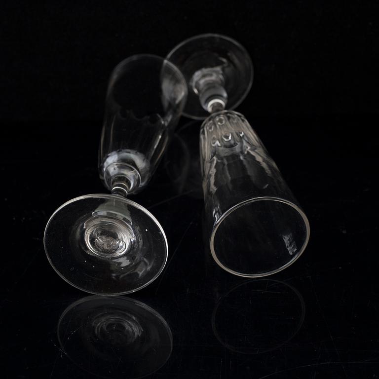 Six champagne flutes, circa 1900.