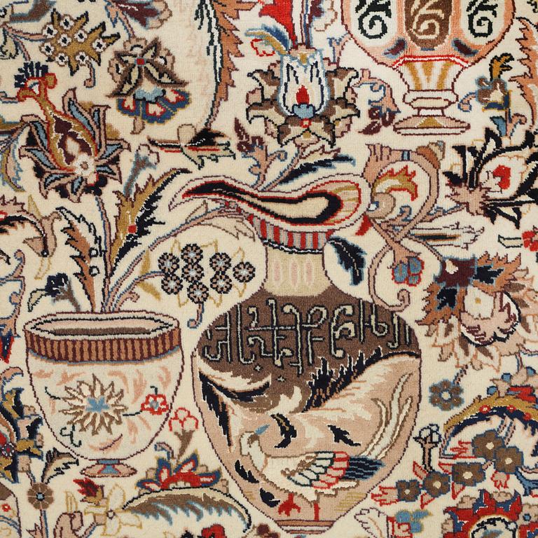 A Kashmar rug, part silk, 396 x 293 cm.