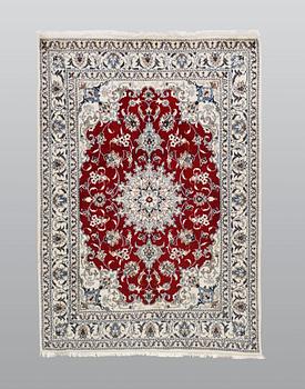 A rug, Nain part silk, ca 208 x 149 cm.