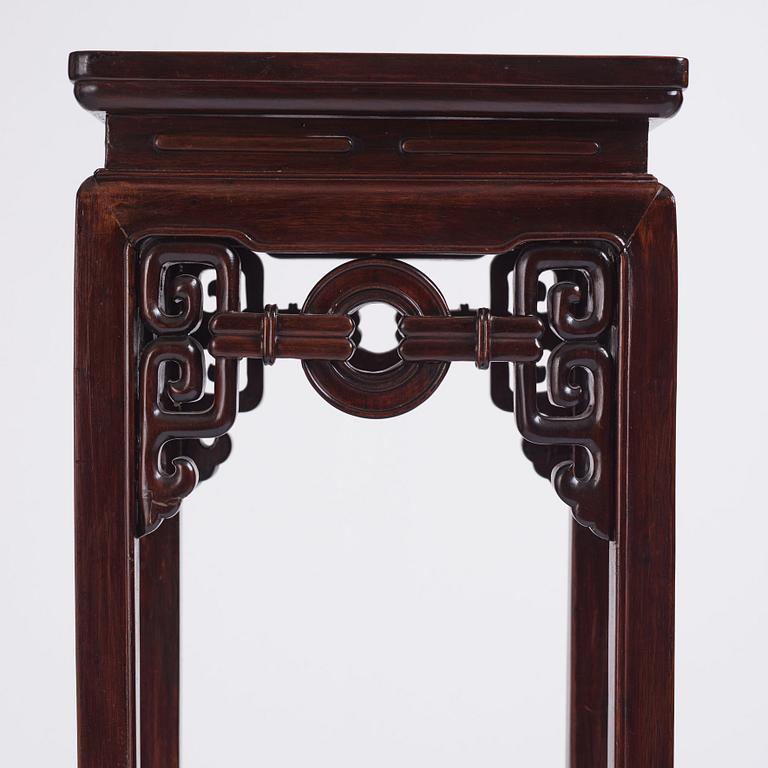 A hardwood tall table/pidestal, late Qing dynasty.