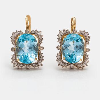 A pair of 18K gold earrings with topazes and diamonds ca. 0.74 ct in total.