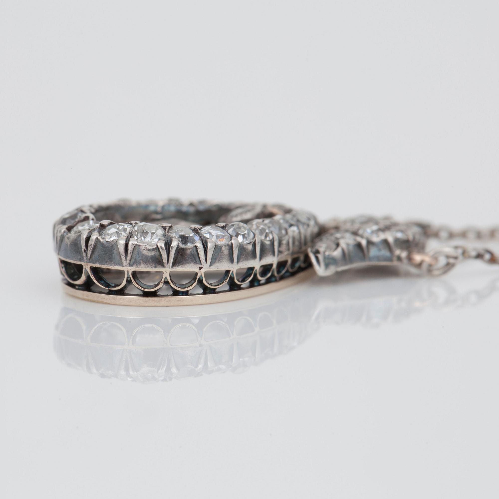 An Edwardian old-cut diamond necklace, total carat weight 1.30 ct.