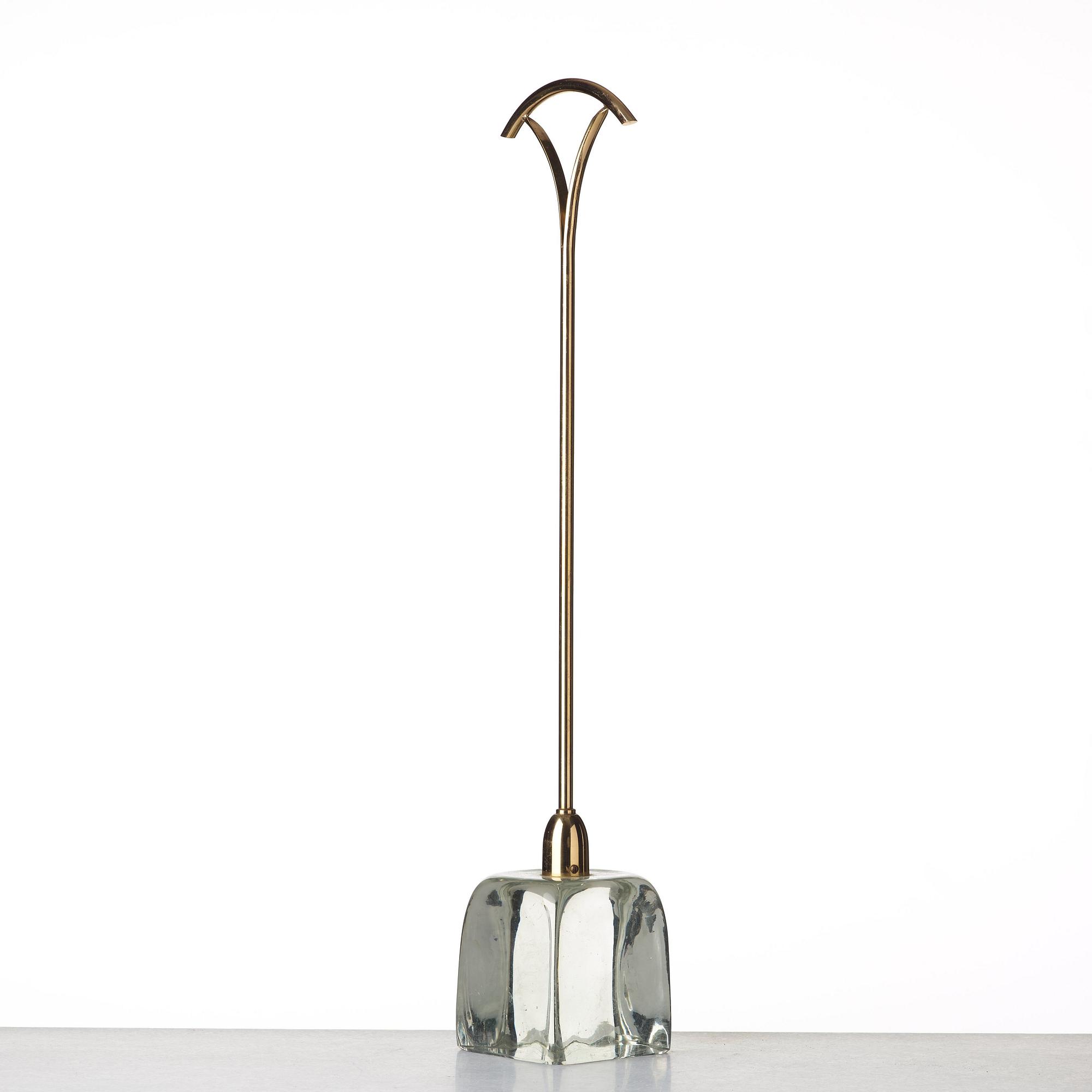 Estrid Ericson, a glass and brass doorstop, Svenskt Tenn, provenance Estrid Ericson.