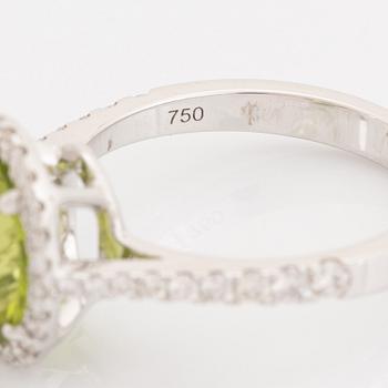 Peridot and brilliant cut diamond ring.