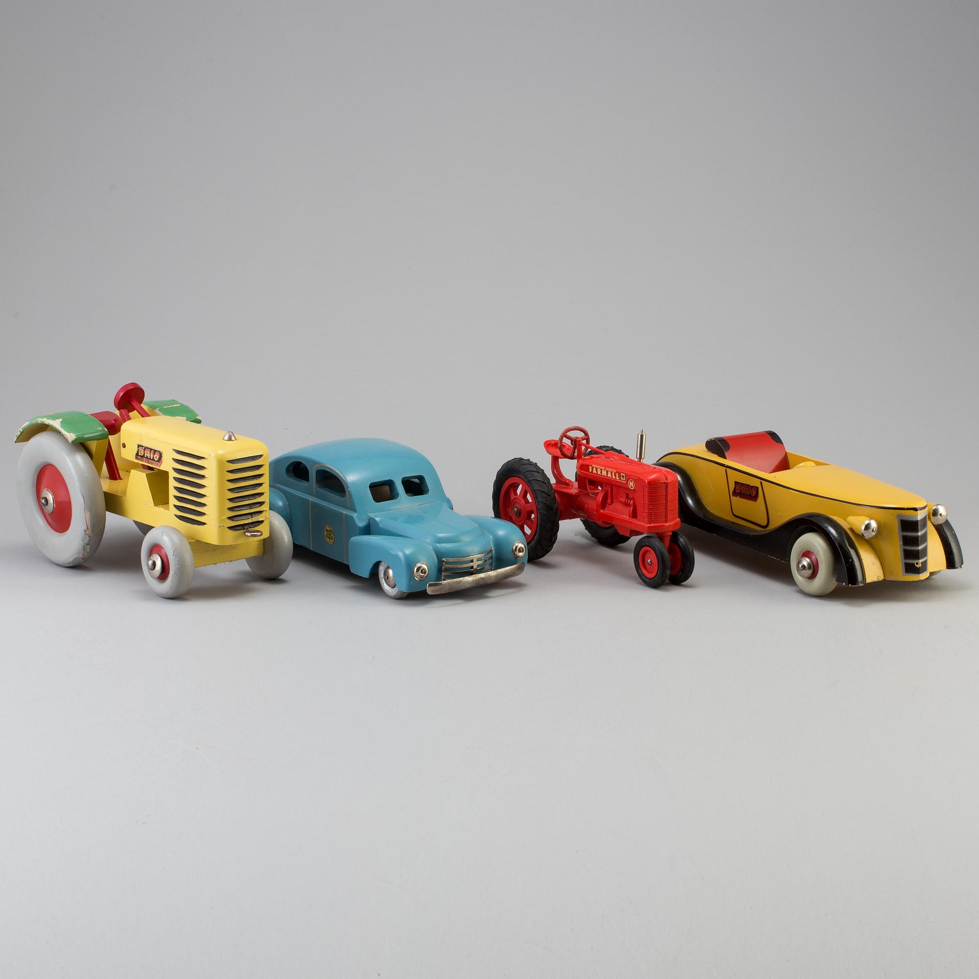 Four wood and plastic toys, Brio and Luck, Sweden, mid 20th century.