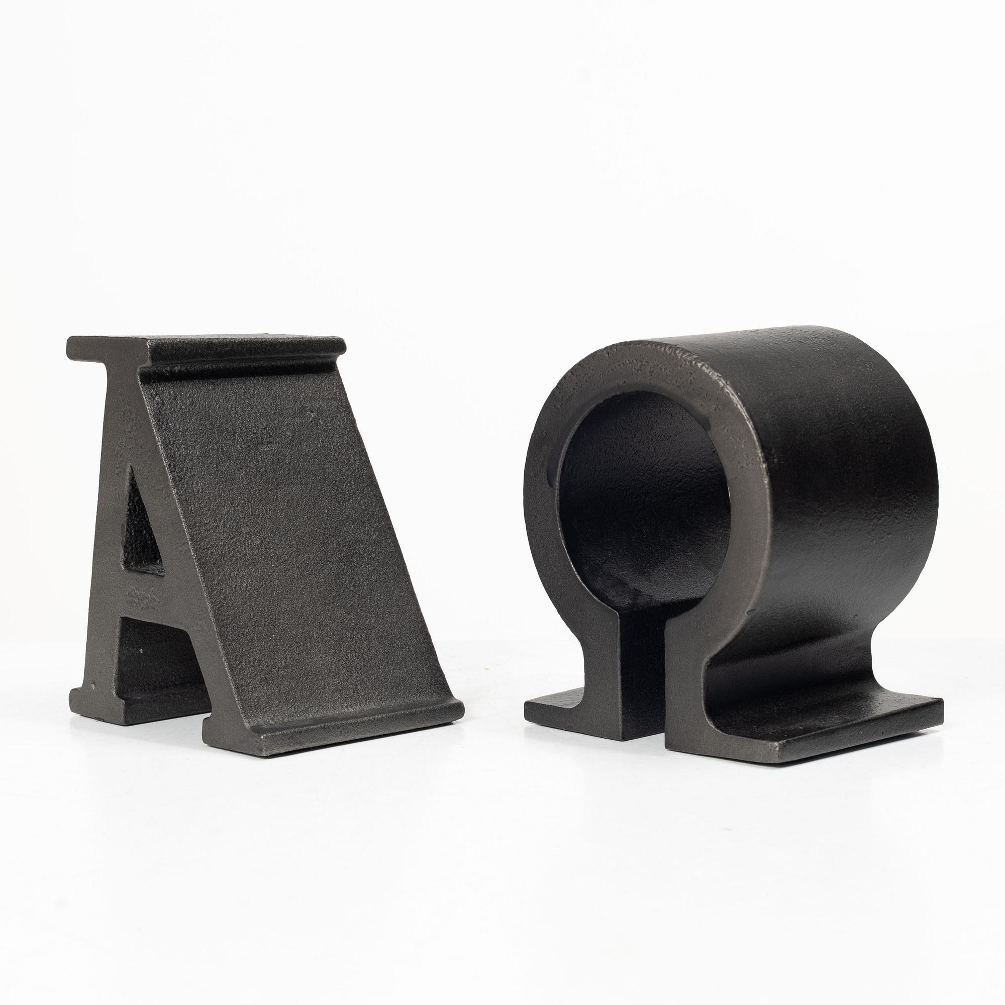 Josef Frank, Bookends, a pair, marked “Alfa & Omega”, Firma Svenskt Tenn.